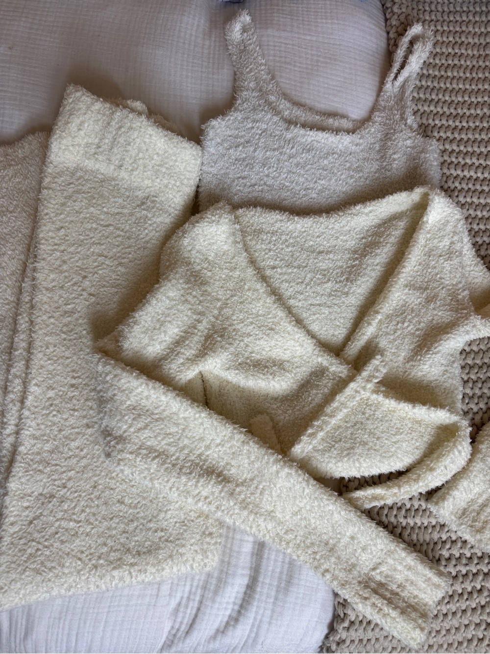 Skims Cream Bouclé lounge set with wrap top, pants, and tank top